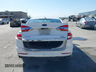 2019 Ford Fusion Hybrid SE with VIN 3FA6P0LU9KR207824, listed as a IAAI auction lot 42153330 with 69,966 mi miles. Bid and sale history available at carsss.com. Image 16.