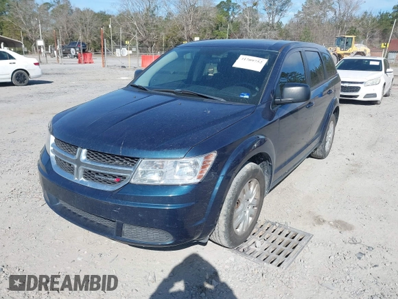 2014 Dodge Journey SE with VIN 3C4PDCABXET277723, listed as a IAAI auction lot 41709752 with 161,587 mi miles and . Bid and sale history available at DreamBid. Image 2.
