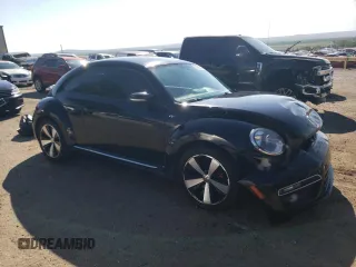 2014 Volkswagen Beetle Turbo R-Line with VIN 3VWVT7AT4EM606319, listed as a Copart auction lot 70489824 with Not Provided miles and Salvage Title. Bid and sale history available at DreamBid. Image 4.