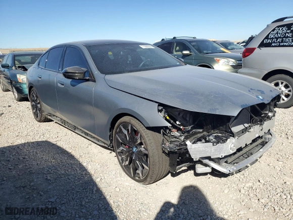 2024 BMW i5 M60 with VIN WBY43FK07RCR13048, listed as a Copart auction lot 71660944 with 5,545 mi miles and Salvage Title. Bid and sale history available at carsss.com. Image 4.