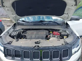 2019 Jeep Compass Trailhawk z VIN 3C4NJDDB3KT760631, wystawiony jako IAAI lot #42681139 z przebiegiem 71 128 mil mil oraz . Historia ofert i sprzedaży dostępna na DreamBid. Obrazek 10.