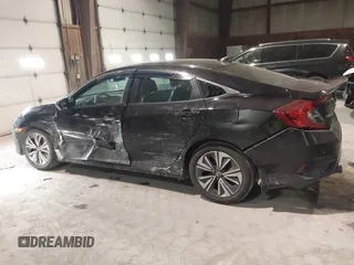 2016 Honda Civic Sedan EX-L with VIN 19XFC1F75GE210803, listed as a IAAI auction lot 41424370 with 111,848 mi miles. Bid and sale history available at carsss.com. Image 14.