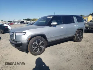 2024 Rivian R1S Adventure with VIN 7PDSGBBA5RN044560, listed as a Copart auction lot 70594924 with 2,449 mi miles and Salvage Title. Bid and sale history available at carsss.com. Image 1.