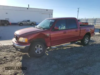 2002 Ford F-150 XLT with VIN 1FTRW08L02KB81578, listed as a Copart auction lot 47069215 with 201,148 mi miles and Salvage Title. Bid and sale history available at carsss.com. Image 1.
