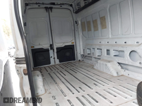 2022 Ford Transit Cargo with VIN 1FTBR3U85NKA64529, listed as a IAAI auction lot 40581639 with 70,680 mi miles and . Bid and sale history available at DreamBid. Image 8.