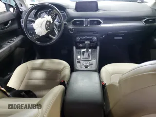 2018 Mazda CX-5 Touring z VIN JM3KFBCM3J0464815, wystawiony jako Copart lot #58794685 z przebiegiem Nie podano mil oraz Szkoda całkowita • Salvage title. Historia ofert i sprzedaży dostępna na DreamBid. Obrazek 8.