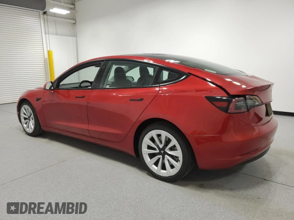2023 Tesla Model 3 with VIN 5YJ3E1EA6PF455789, listed as a Copart auction lot 54715665 with 64,658 mi miles and Salvage Title. Bid and sale history available at DreamBid. Image 2.