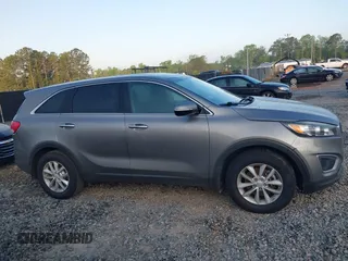 2017 Kia Sorento LX z VIN 5XYPG4A36HG259429, wystawiony jako IAAI lot #41948637 z przebiegiem 150 151 mil mil oraz . Historia ofert i sprzedaży dostępna na DreamBid. Obrazek 13.