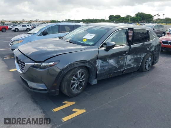 2021 Mazda CX-9 Touring с VIN JM3TCACY4M0511512, выставлен на аукционе IAAI как лот 42376544 с пробегом 50 485 миль миль и . История ставок и продаж доступна на DreamBid. Изображение 17.