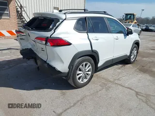 2022 Toyota Corolla Cross LE with VIN 7MUCAABG7NV013235, listed as a IAAI auction lot 41796408 with 20,943 mi miles and . Bid and sale history available at DreamBid. Image 4.