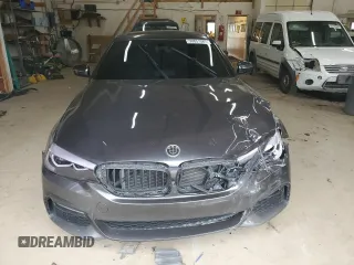 2018 BMW 5 Series 540i xDrive z VIN WBAJE7C59JWC56481, wystawiony jako Copart lot #50831085 z przebiegiem 105 558 mil mil oraz Szkoda całkowita • Salvage title. Historia ofert i sprzedaży dostępna na DreamBid. Obrazek 5.