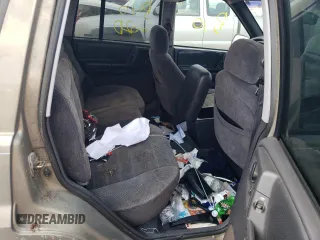 1997 Jeep Grand Cherokee Laredo z VIN 1J4GZ58S4VC502596, wystawiony jako Copart lot #88255865 z przebiegiem Nie podano mil oraz Nie do naprawy • Non repairable. Historia ofert i sprzedaży dostępna na DreamBid. Obrazek 10.