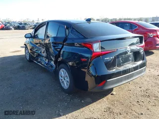 2021 Toyota Prius L Eco with VIN JTDKAMFU1M3134107, listed as a IAAI auction lot 41763080 with 185,248 mi miles. Bid and sale history available at carsss.com. Image 3.