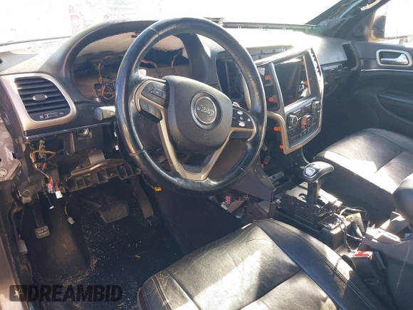 2014 Jeep Grand Cherokee Limited with VIN 1C4RJEBT5EC228056, listed as a IAAI auction lot 41454896 with Not Provided miles and . Bid and sale history available at DreamBid. Image 6.