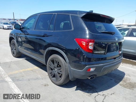 2021 Honda Passport Sport z VIN 5FNYF8H21MB038592, wystawiony jako IAAI lot #41955838 z przebiegiem 31 844 mil mil oraz . Historia ofert i sprzedaży dostępna na DreamBid. Obrazek 3.