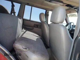 1998 Jeep Cherokee Sport with VIN 1J4FT68S8WL251781, listed as a Copart auction lot 71562574 with 267,648 mi miles and Non Repairable. Bid and sale history available at carsss.com. Image 11.