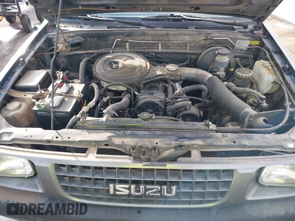 1993 Isuzu Pickup S z VIN 4S1CL11L7P4207354, wystawiony jako IAAI lot #41237021 z przebiegiem 192 502 mil mil oraz . Historia ofert i sprzedaży dostępna na DreamBid. Obrazek 10.