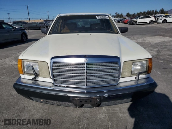1986 Mercedes-Benz 560 with VIN WDBCA39D6GA238259, listed as a Copart auction lot 89204495 with 106,746 mi miles and Salvage Title. Bid and sale history available at DreamBid. Image 5.