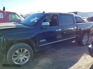 2014 Chevrolet Silverado 1500 High Country with VIN 3GCUKTEC1EG437170, listed as a IAAI auction lot 41742882 with 101,779 mi miles. Bid and sale history available at carsss.com. Image 14.
