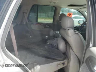 2005 GMC Envoy SLT with VIN 1GKDT13S052311455, listed as a Copart auction lot 73635434 with Not Provided miles and Salvage Title. Bid and sale history available at DreamBid. Image 11.