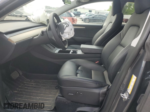 2023 Tesla Model Y Long Range z VIN 7SAYGDEE2PA041350, wystawiony jako Copart lot #56657005 z przebiegiem 25 090 mil mil oraz Szkoda całkowita • Salvage title. Historia ofert i sprzedaży dostępna na DreamBid. Obrazek 7.