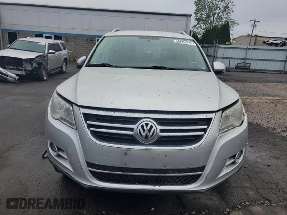2011 Volkswagen Tiguan SE with VIN WVGBV7AXXBW538750, listed as a Copart auction lot 56604715 with 86,895 mi miles and Salvage title. Bid and sale history available at DreamBid. Image 5.