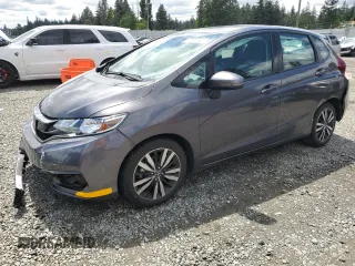 2018 Honda Fit EX-L with VIN 3HGGK5H93JM722376, listed as a Copart auction lot 57913595 with 75,714 mi miles and Salvage title. Bid and sale history available at DreamBid. Image 1.