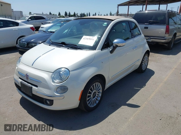 2012 FIAT 500 Lounge with VIN 3C3CFFER2CT384610, listed as a IAAI auction lot 42369091 with 116,870 mi miles and . Bid and sale history available at DreamBid. Image 2.