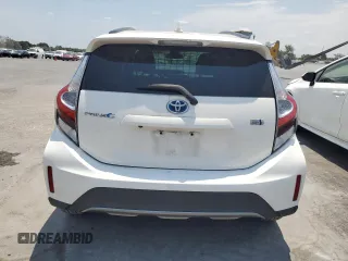 2018 Toyota Prius One z VIN JTDKDTB37J1615467, wystawiony jako Copart lot #52741245 z przebiegiem 63 666 mil mil oraz Czysty tytuł • Clean title. Historia ofert i sprzedaży dostępna na DreamBid. Obrazek 6.