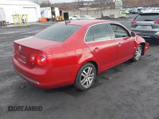 2006 Volkswagen Jetta 2.5L z VIN 3VWSF71KX6M681223, wystawiony jako IAAI lot #41645643 z przebiegiem 72 631 mil mil oraz . Historia ofert i sprzedaży dostępna na DreamBid. Obrazek 4.
