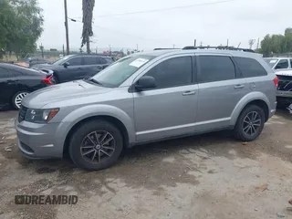 2018 Dodge Journey SE with VIN 3C4PDCAB1JT141295, listed as a IAAI auction lot 42098218 with 110,691 mi miles. Bid and sale history available at carsss.com. Image 14.