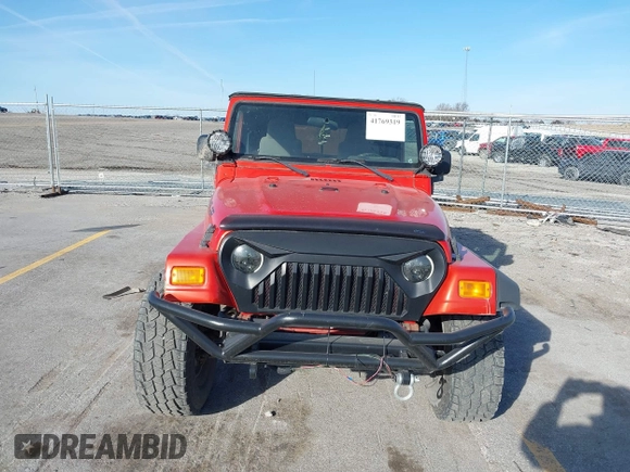 2005 Jeep Wrangler Sport with VIN 1J4FA49S85P344204, listed as a IAAI auction lot 41769319 with 105,927 mi miles. Bid and sale history available at carsss.com. Image 12.
