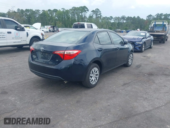 2018 Toyota Corolla L with VIN 2T1BURHE6JC995411, listed as a IAAI auction lot 42516337 with 98,066 mi miles and . Bid and sale history available at DreamBid. Image 4.