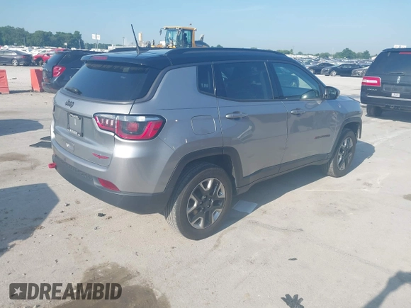 2017 Jeep Compass Trailhawk with VIN 3C4NJDDB3HT624492, listed as a IAAI auction lot 42618883 with 105,140 mi miles and . Bid and sale history available at DreamBid. Image 4.