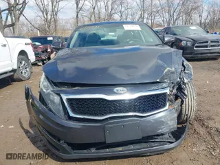 2011 Kia Optima EX with VIN KNAGN4A75B5156895, listed as a IAAI auction lot 41729991 with 151,348 mi miles. Bid and sale history available at carsss.com. Image 12.