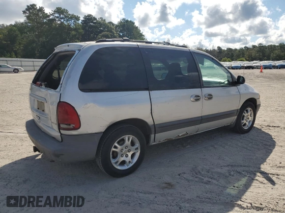 2000 Dodge Caravan SE with VIN 2B4GP45G0YR525310, listed as a Copart auction lot 69596394 with 299,957 mi miles and Salvage Title. Bid and sale history available at carsss.com. Image 3.