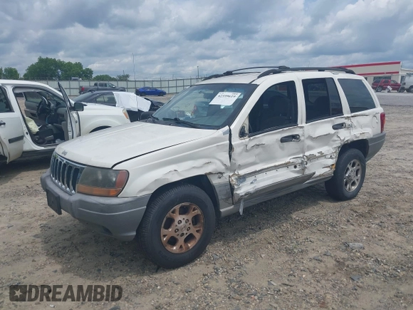 1999 Jeep Grand Cherokee Laredo with VIN 1J4GW58S3XC505985, listed as a IAAI auction lot 42399619 with 253,876 mi miles and . Bid and sale history available at DreamBid. Image 2.
