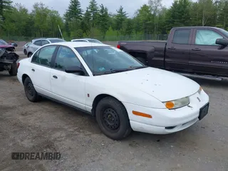 2000 Saturn SL z VIN 1G8ZH5287YZ240650, wystawiony jako IAAI lot #42274381 z przebiegiem 184 198 mil mil oraz . Historia ofert i sprzedaży dostępna na DreamBid. Obrazek 1.