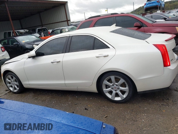 2013 Cadillac ATS z VIN 1G6AA5RX9D0156125, wystawiony jako IAAI lot #41964124 z przebiegiem 139 869 mil mil oraz . Historia ofert i sprzedaży dostępna na DreamBid. Obrazek 13.
