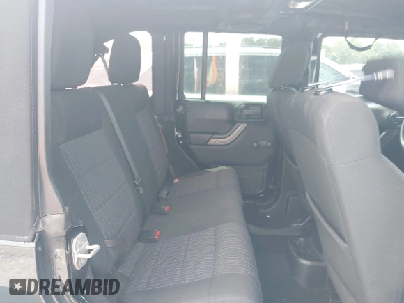 2012 Jeep Wrangler Unlimited Sport with VIN 1C4BJWDG0CL233718, listed as a IAAI auction lot 42551935 with 227,693 mi miles and . Bid and sale history available at DreamBid. Image 8.