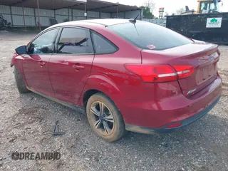 2016 Ford Focus SE with VIN 1FADP3FE6GL208688, listed as a IAAI auction lot 40980789 with 105,954 mi miles. Bid and sale history available at carsss.com. Image 3.