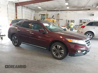 2014 Honda Crosstour EX-L z VIN 5J6TF2H56EL800907, wystawiony jako IAAI lot #42077808 z przebiegiem 139 510 mil mil oraz . Historia ofert i sprzedaży dostępna na DreamBid. Obrazek 1.