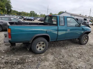 1997 Nissan Frontier XE with VIN 1N6SD16Y0VC329686, listed as a Copart auction lot 73103584 with 105,657 mi miles and Salvage title. Bid and sale history available at DreamBid. Image 3.
