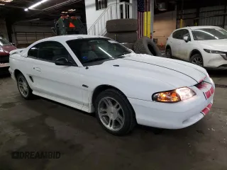 1997 Ford Mustang GT with VIN 1FALP42X3VF140564, listed as a Copart auction lot 44240605 with 120,738 mi miles and Salvage title. Bid and sale history available at DreamBid. Image 4.