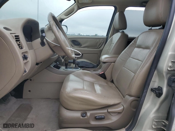 2005 Ford Escape Limited with VIN 1FMYU04195KB37679, listed as a Copart auction lot 50656585 with 218,891 mi miles and Salvage Title. Bid and sale history available at carsss.com. Image 7.