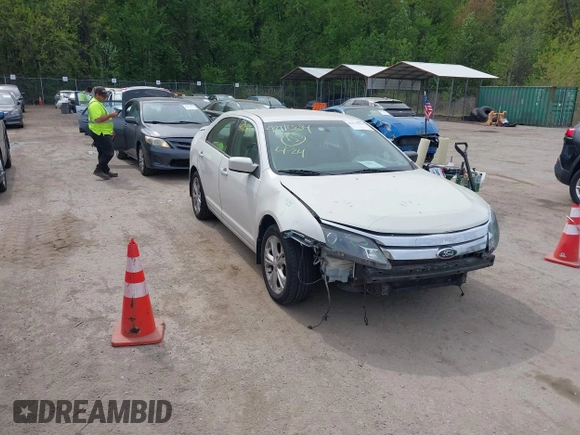 2012 Ford Fusion SE with VIN 3FAHP0HG7CR351904, listed as a IAAI auction lot 42115834 with 80,659 mi miles and . Bid and sale history available at DreamBid. Image 1.