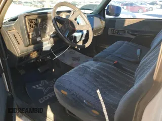 1991 GMC Sierra 1500 with VIN 2GTGC29K3M1532424, listed as a Copart auction lot 86216144 with 173,257 mi miles and Salvage Title. Bid and sale history available at DreamBid. Image 8.