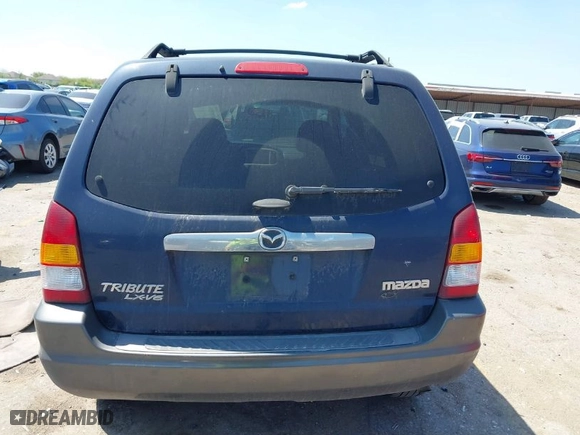 2003 Mazda Tribute LX with VIN 4F2CZ04133KM23234, listed as a IAAI auction lot 41869955 with 240,898 mi miles. Bid and sale history available at carsss.com. Image 16.