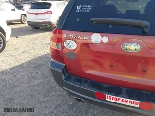 2005 Kia Sportage LX with VIN KNDJF723457078461, listed as a IAAI auction lot 41948080 with 104,330 mi miles. Bid and sale history available at carsss.com. Image 15.
