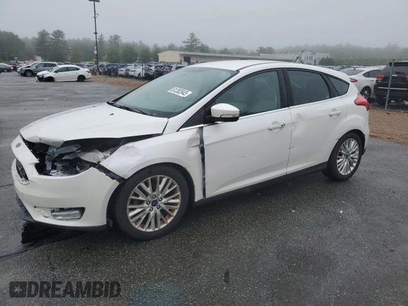 2016 Ford Focus Titanium with VIN 1FADP3N2XGL321275, listed as a Copart auction lot 61282845 with 111,519 mi miles and Salvage title. Bid and sale history available at DreamBid. Image 1.